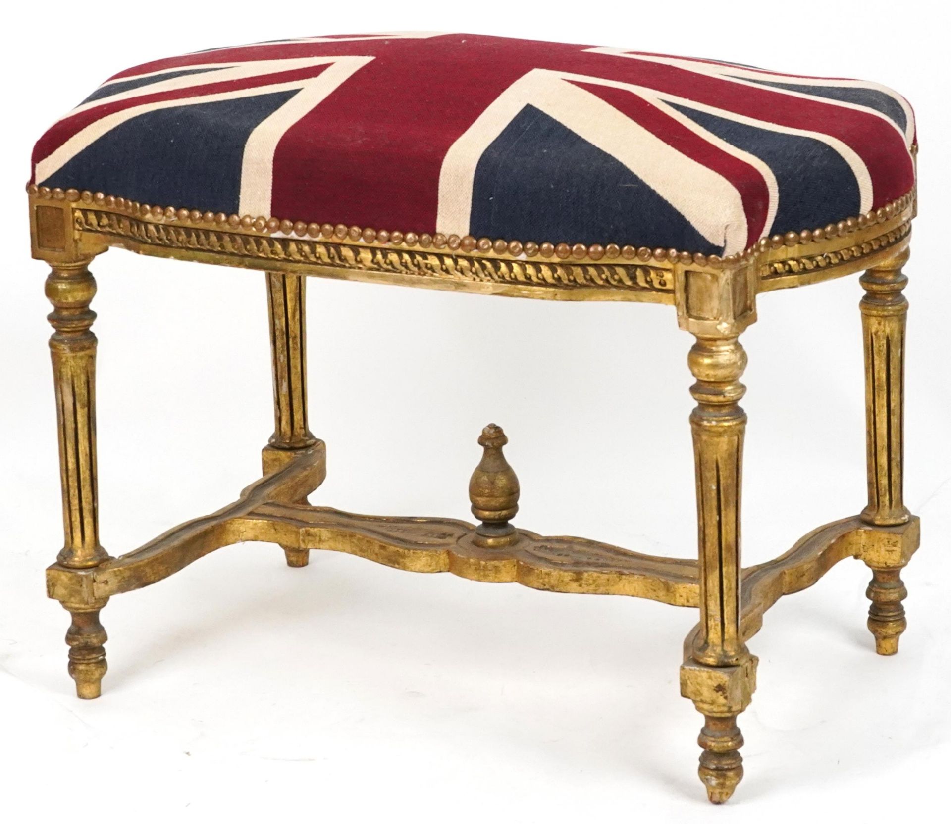 French style gilt stool with H stretcher on reeded legs with Union Jack design cushioned seat,