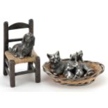 Two miniature silver and wicker animals comprising cat in a basket with kittens and a dog seated