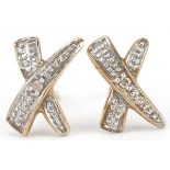 Pair of 9ct gold diamond cross stud earrings, each 1cm wide, total 0.6g