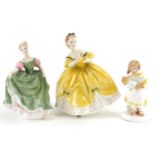 Three collectable Royal Doulton figurines comprising What's the Matter, Michel and The Last Waltz,