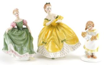Three collectable Royal Doulton figurines comprising What's the Matter, Michel and The Last Waltz,