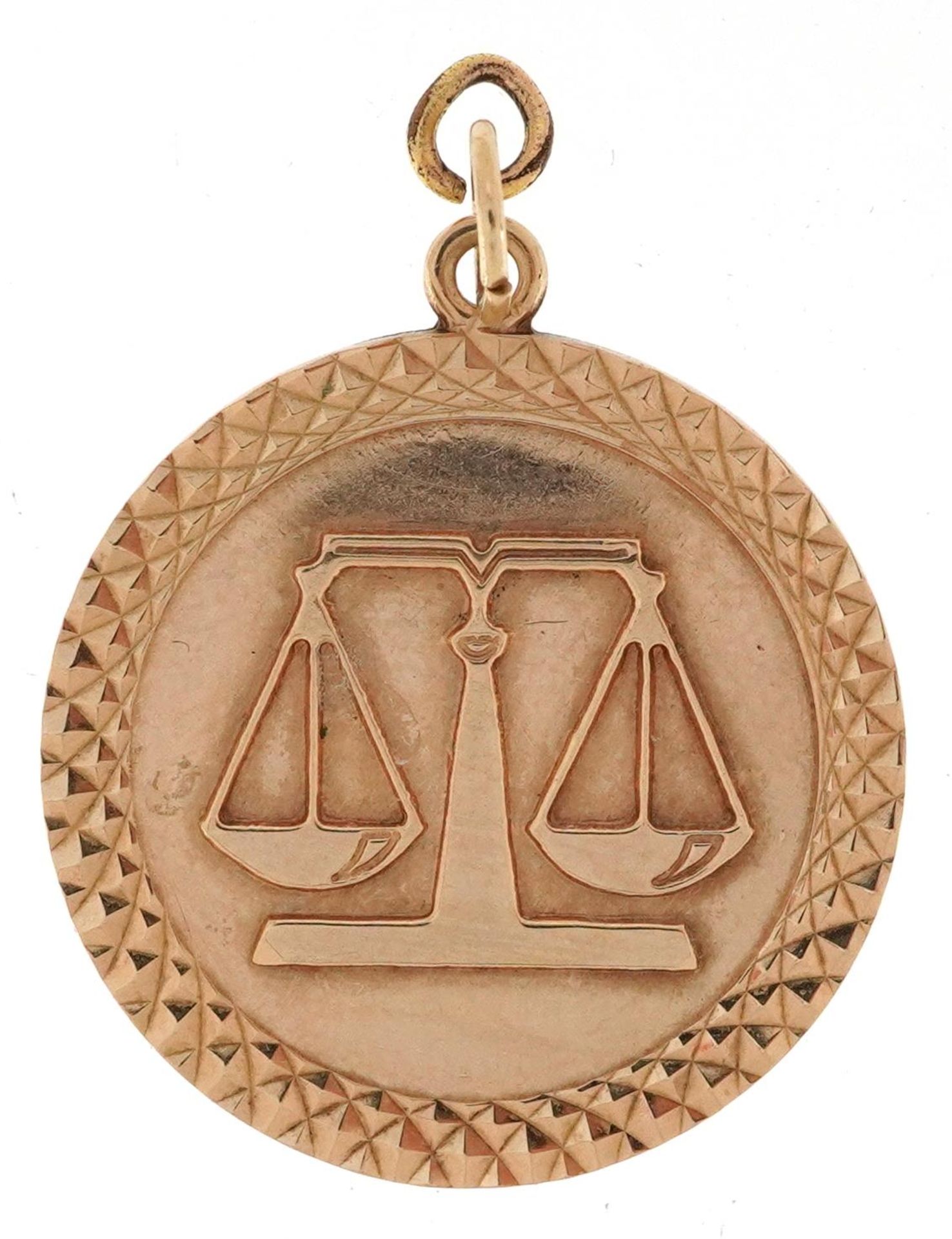 9ct gold masonic interest pendant in the form of mason's scales, 2.4cm in diameter, 4.8g