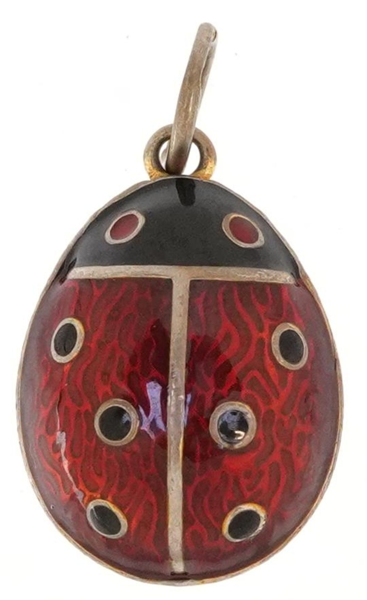 Silver gilt and guilloche enamel egg pendant in the form of a ladybird, impressed Russian marks to