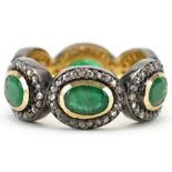 Unmarked yellow and white metal emerald and diamond ring, total emerald weight approximately 2.55