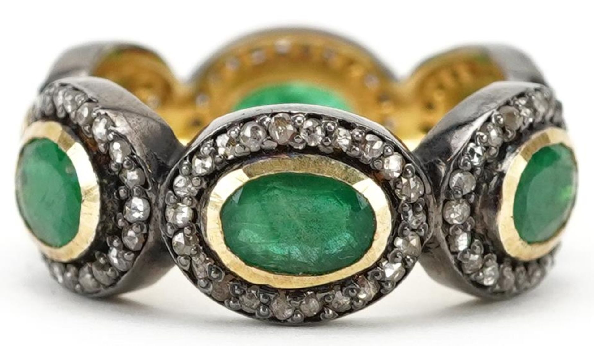 Unmarked yellow and white metal emerald and diamond ring, total emerald weight approximately 2.55