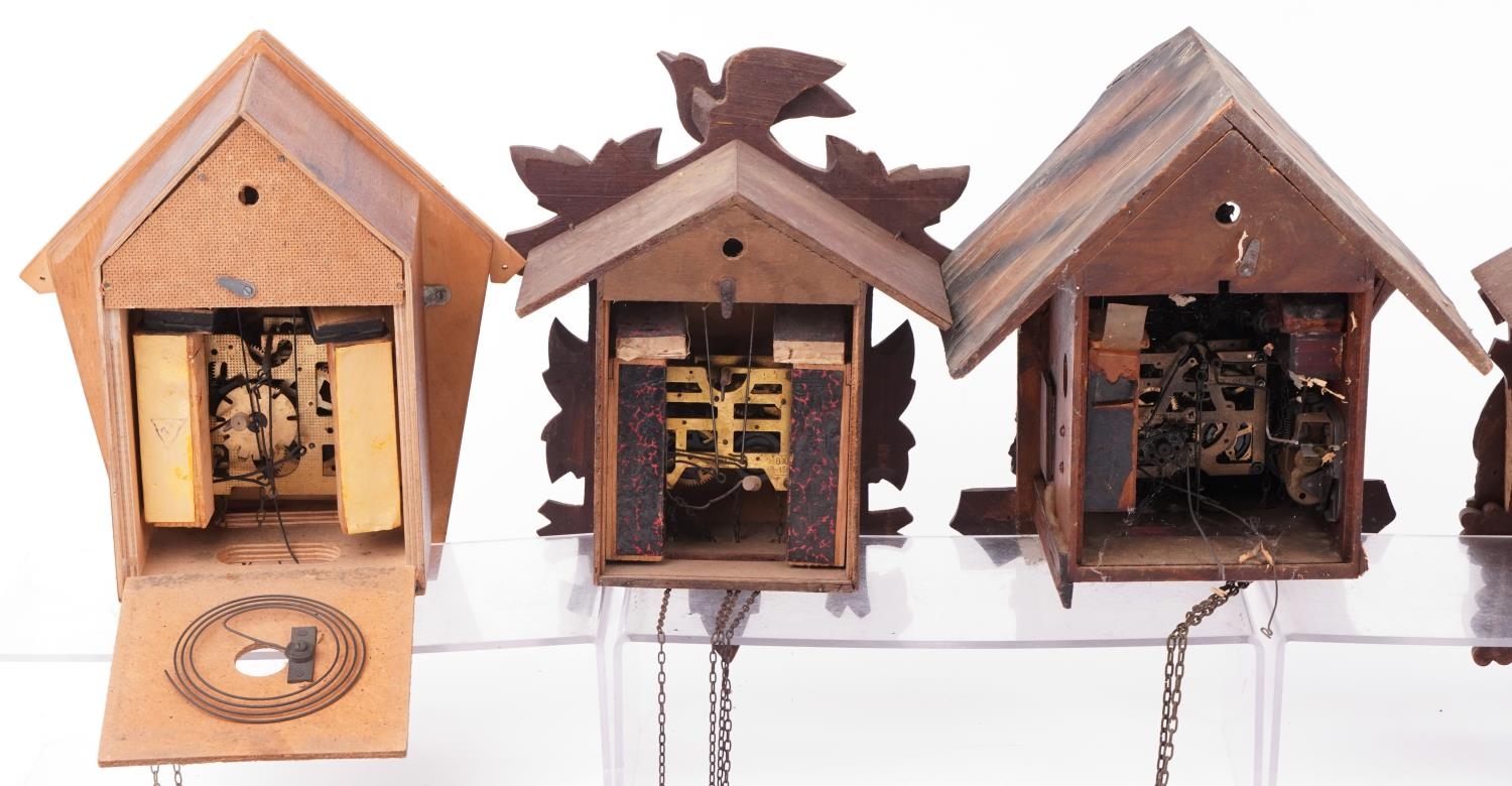 Four German carved Black Forest cuckoo clocks and a Russian USSR example by Veaga, the largest - Image 9 of 10