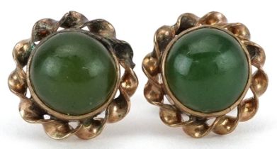 Pair of 18K gold cabochon green jade stud earrings, each 10mm in diameter, total 2.2g