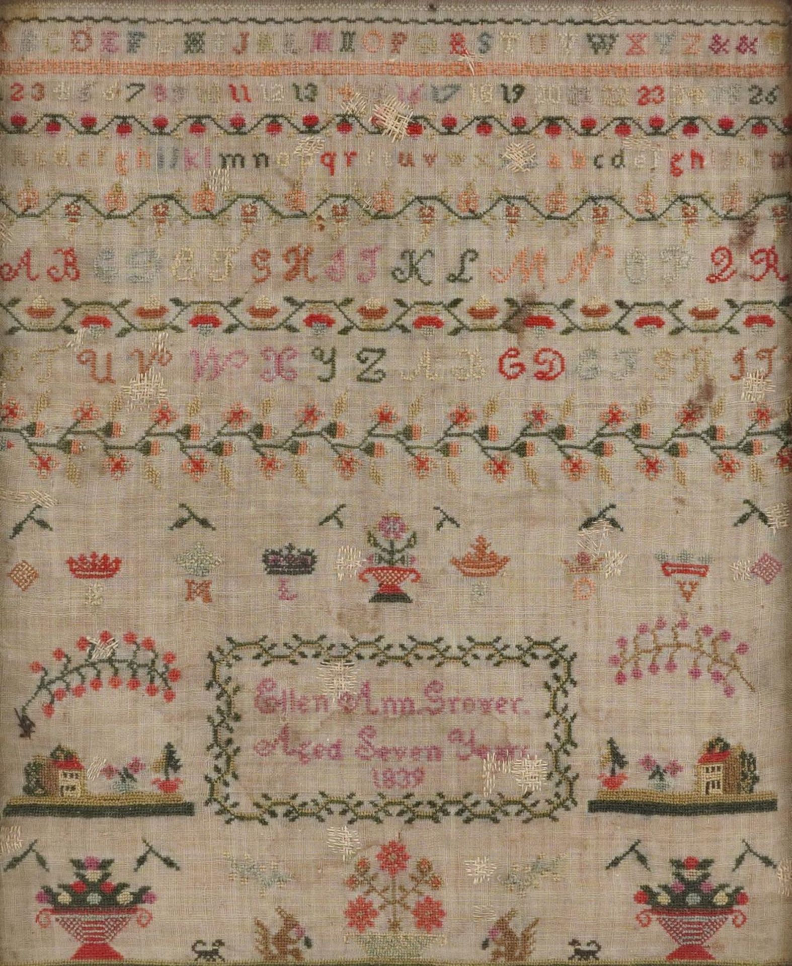 Early Victorian needlework sampler worked by Ellen Ann Grover aged seven years, dated 1839, framed