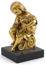 19th century gilt bronze statuette of a young musician playing an instrument, raised on a