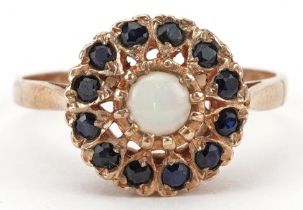 9ct gold cabochon opal and black spinel cluster ring with pierced setting, size P, 2.6g