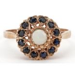 9ct gold cabochon opal and black spinel cluster ring with pierced setting, size P, 2.6g