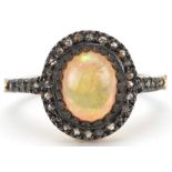 Silver gilt cabochon opal and diamond cluster ring with diamond set shoulders, total diamond
