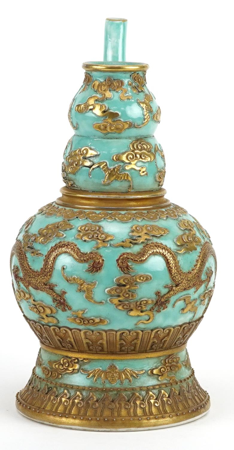 Chinese porcelain turquoise ground wine vessel gilded with dragons and bats amongst clouds, six - Image 3 of 8
