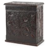 19th century oak table top collector's chest finely and profusely carved with foliage having