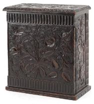 19th century oak table top collector's chest finely and profusely carved with foliage having