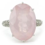 9ct white gold pink quartz ring with diamond set shoulders, the quartz approximately 17.80mm x 13.