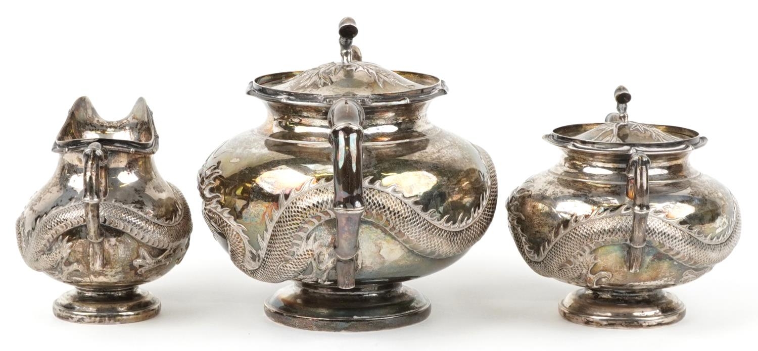 Chinese export silver and three piece tea service having simulated bamboo handles embossed with - Image 3 of 8
