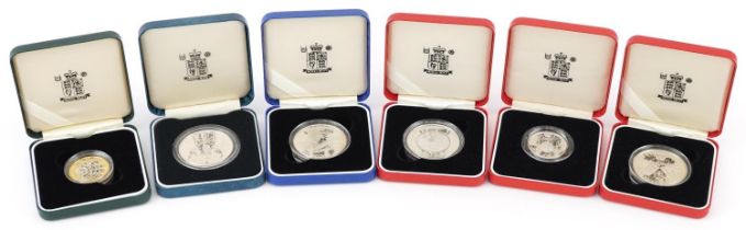 Six silver proof coins by The Royal mint with fitted cases and certificates, comprising 90th