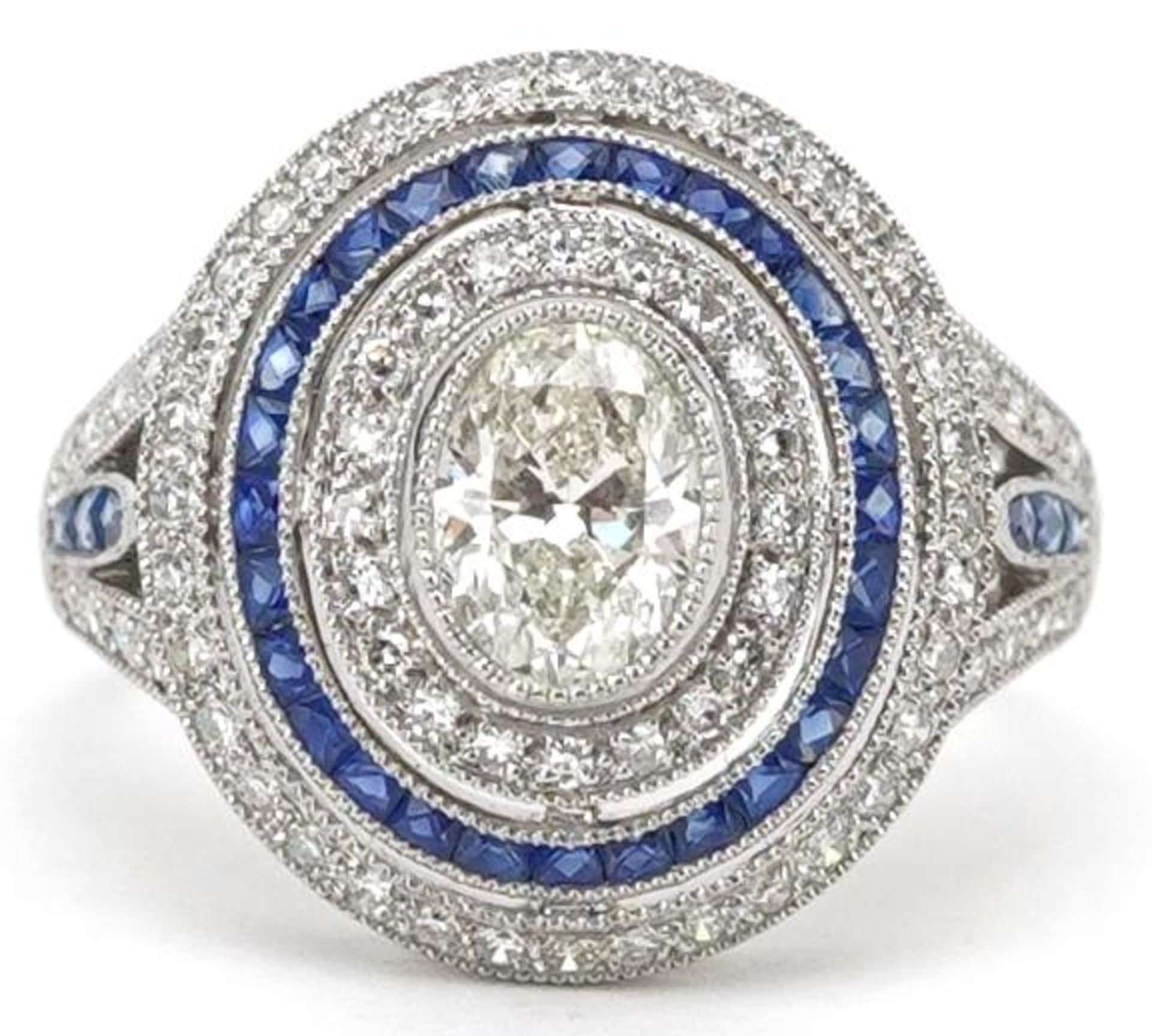 Art Deco style platinum diamond and sapphire four tier cluster ring, total diamond weight