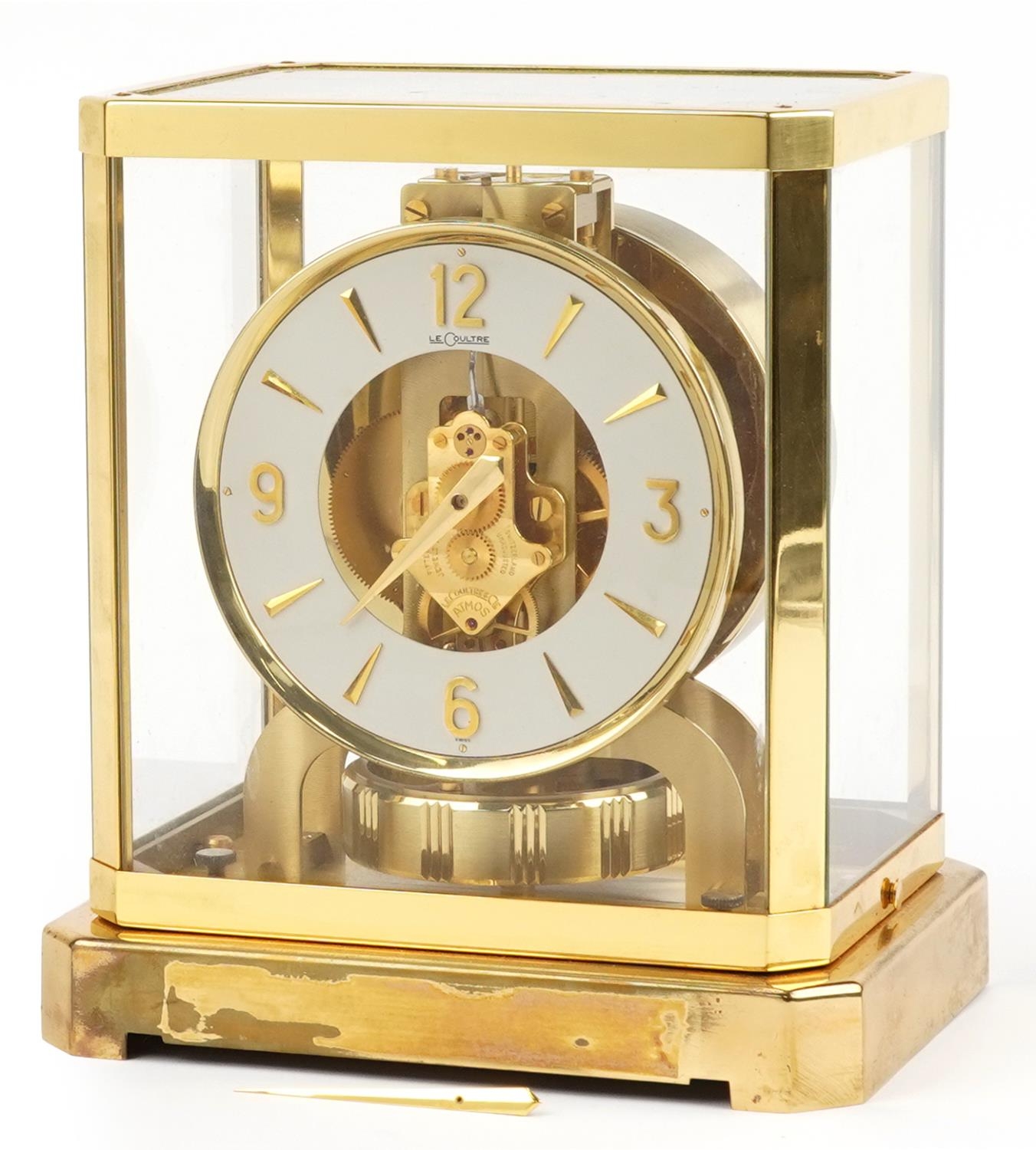 Jaeger LeCoultre brass cased Atmos clock with circular chapter ring having Arabic numerals, serial