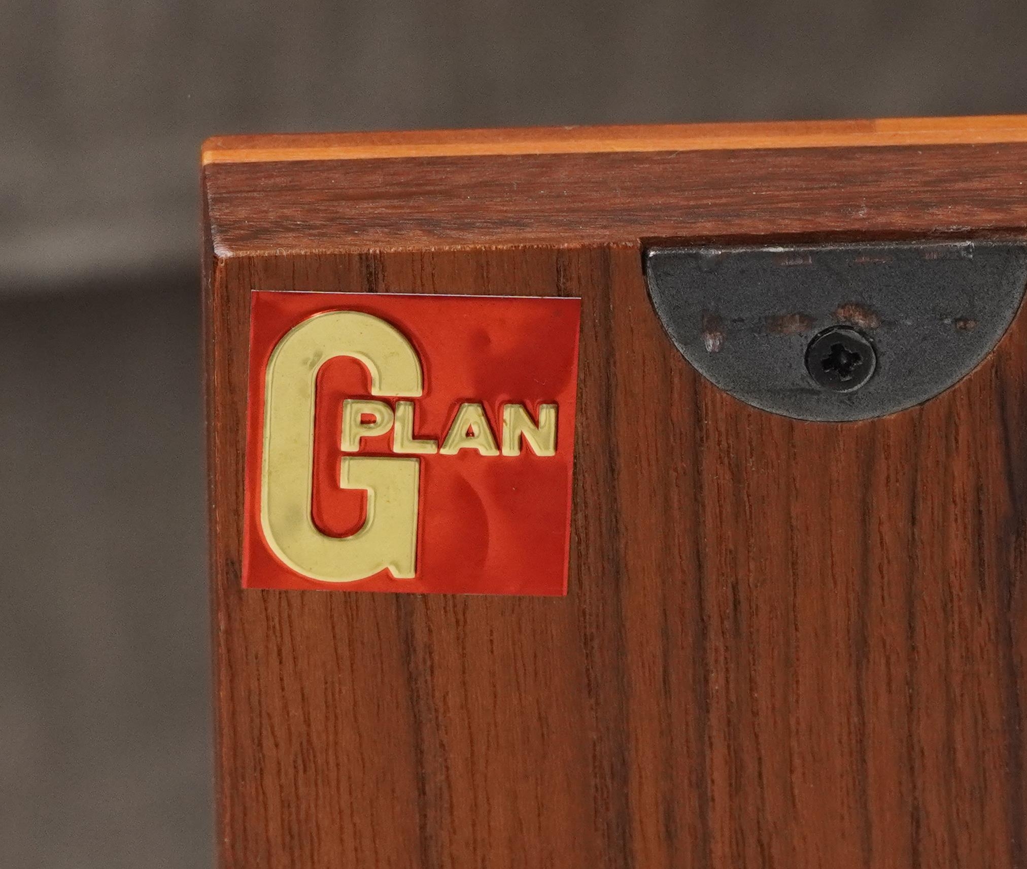 G Plan, Mid century Fresco teak sideboard on hairpin legs fitted with a door and an arrangement of - Image 3 of 4