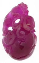 Chinese pink tourmaline pendant carved with a water dragon and fruit, 6.5cm high