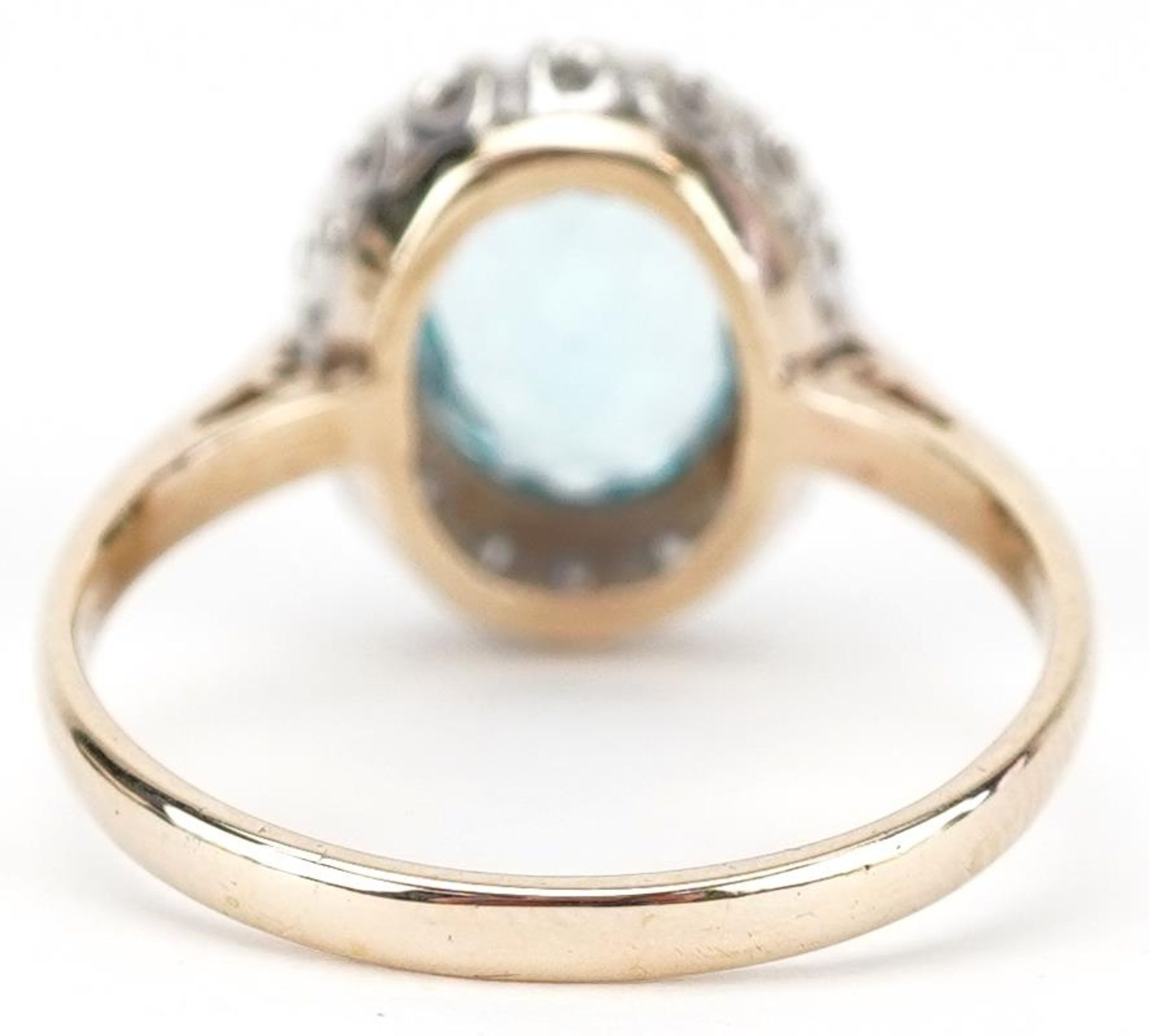 9ct gold blue topaz and diamond cluster ring, the topaz approximately 9.0mm x 6.50mm x 4.70mm - Image 2 of 5