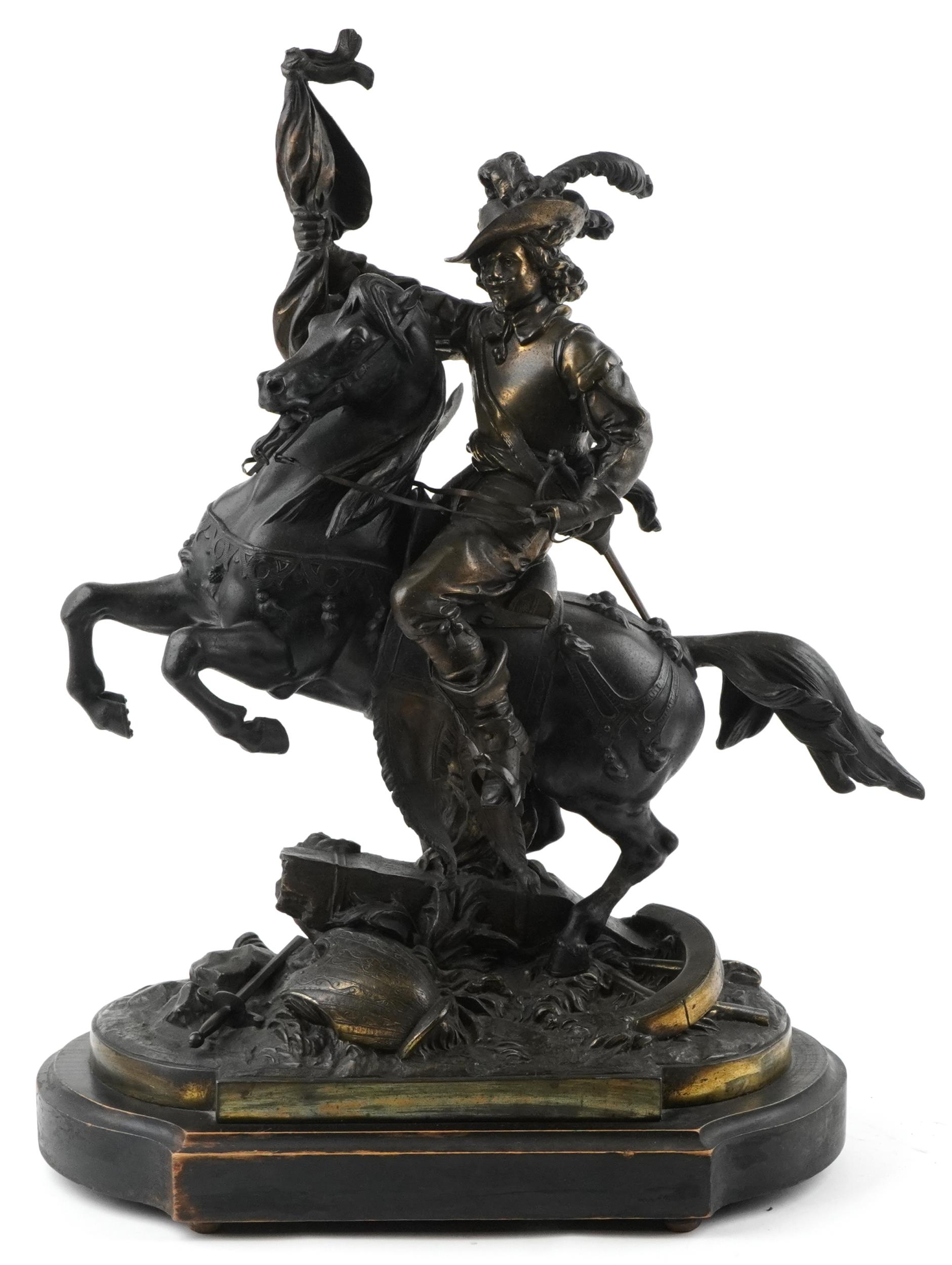 Large 19th century classical patinated spelter sculpture of a Cavalier on horseback raised on a