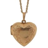 9ct gold floral engraved love heart locket on a 9ct gold necklace, 3cm high and 60cm in length, 6.8g