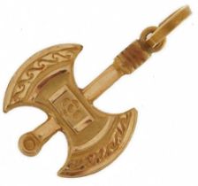 High carat gold charm in the form of a Viking axe, tests as 18ct+ gold, indistinct mark to the