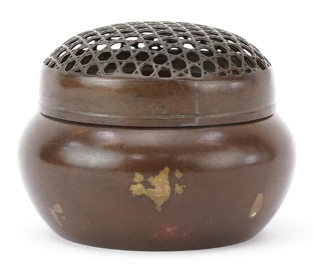 Chinese gold splashed censer with pierced cover, character marks to the base, 7.5cm in diameter