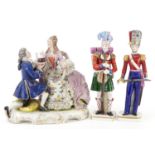 Continental porcelain comprising a Neapolitan lace figure group of a female and waiter and two