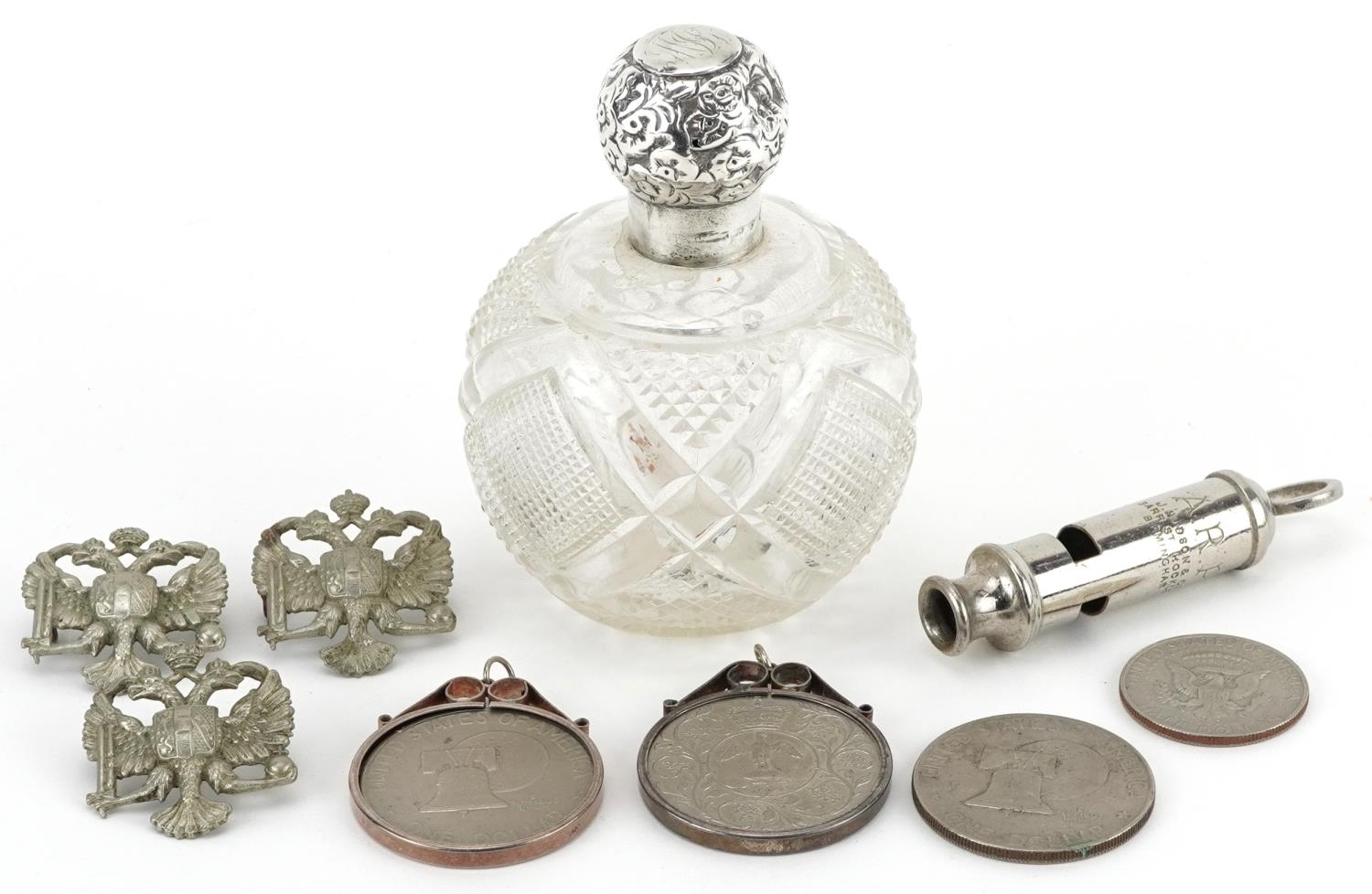Sundry items including a silver topped cut glass scent bottle, three American dollars, two with