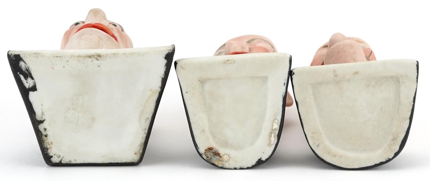 Schafer & Vater, three smoking interest early 20th century German bisque smoking head ashtrays, - Image 3 of 4