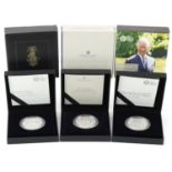 Three silver proof coins by The Royal Mint with cases and boxes, comprising 2019 one ounce coin