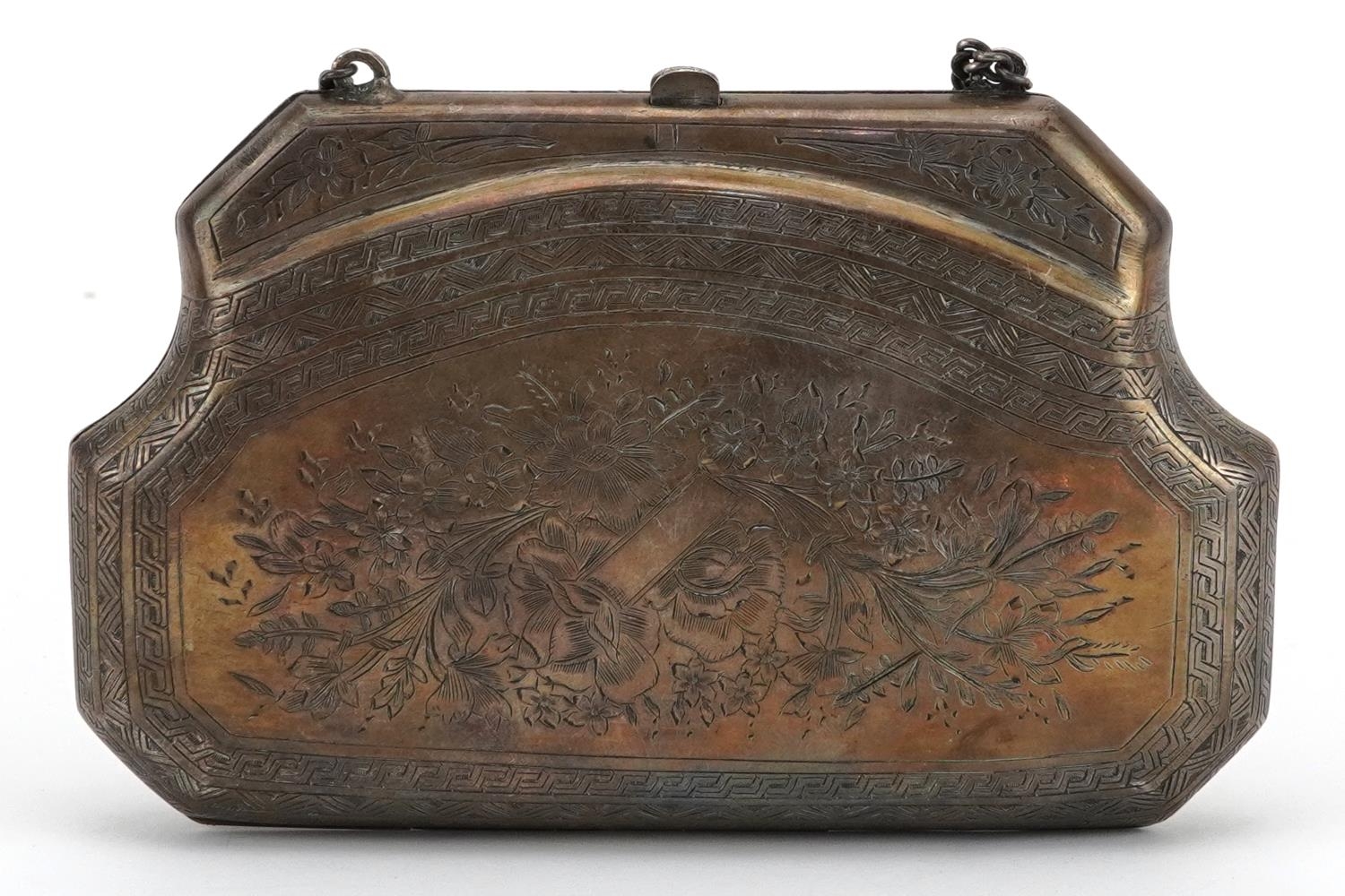 19th century heavy unmarked silver concertina purse profusely engraved with foliage, tests as