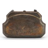 19th century heavy unmarked silver concertina purse profusely engraved with foliage, tests as