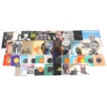 Vinyl LP records and 45rpms including Marc Bolan & T Rex, The Beatles, The Eagles, Wings, Bob