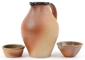 John Leach, Muchelney studio pottery including a large jug having a brown glaze, the largest 30cm