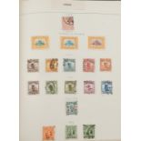 Collection of world stamps arranged in four albums or stock books