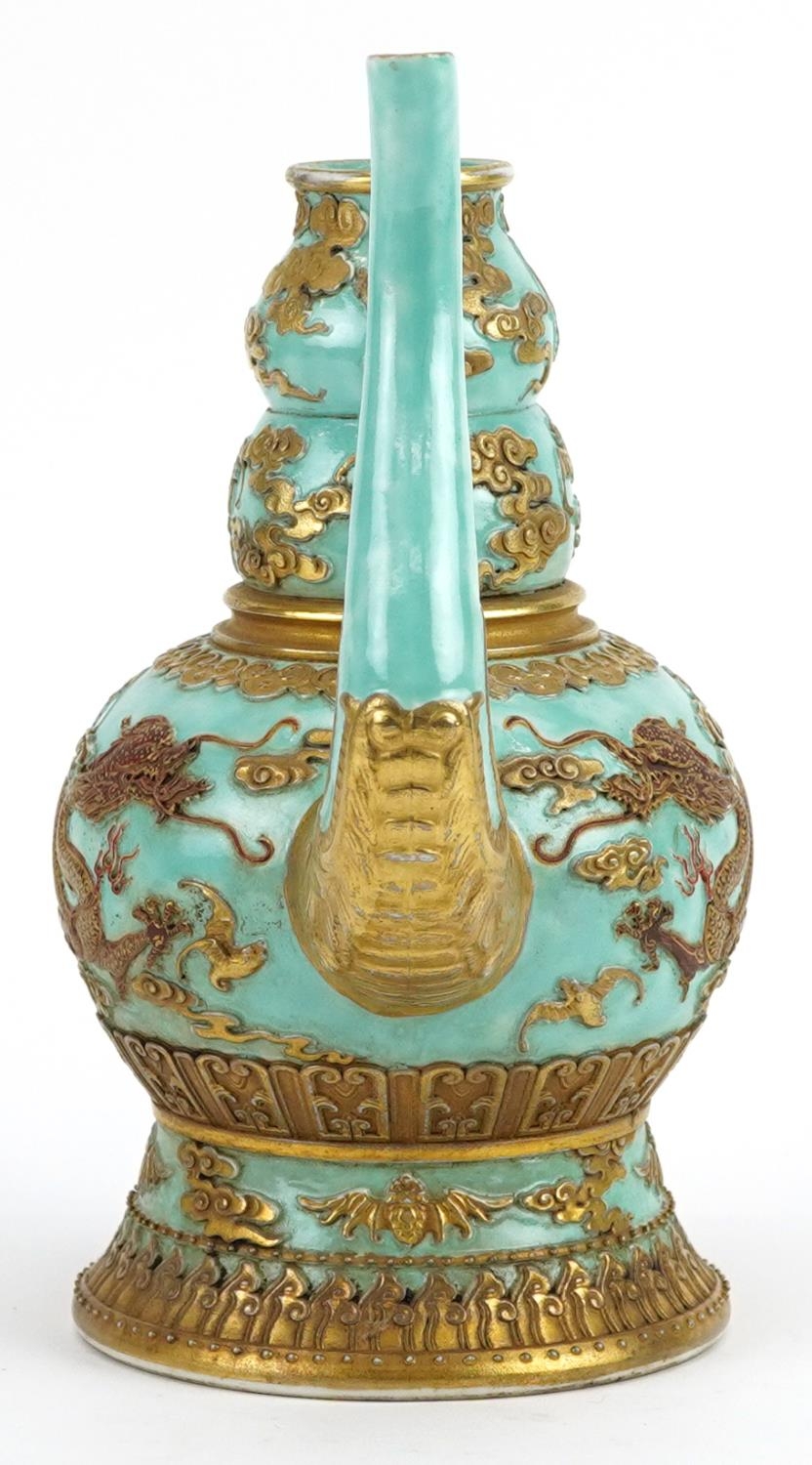 Chinese porcelain turquoise ground wine vessel gilded with dragons and bats amongst clouds, six - Image 5 of 8