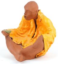 Neil Wilkinson, contemporary Brutalist terracotta sculpture with gesso and enamel paint of a beggar,