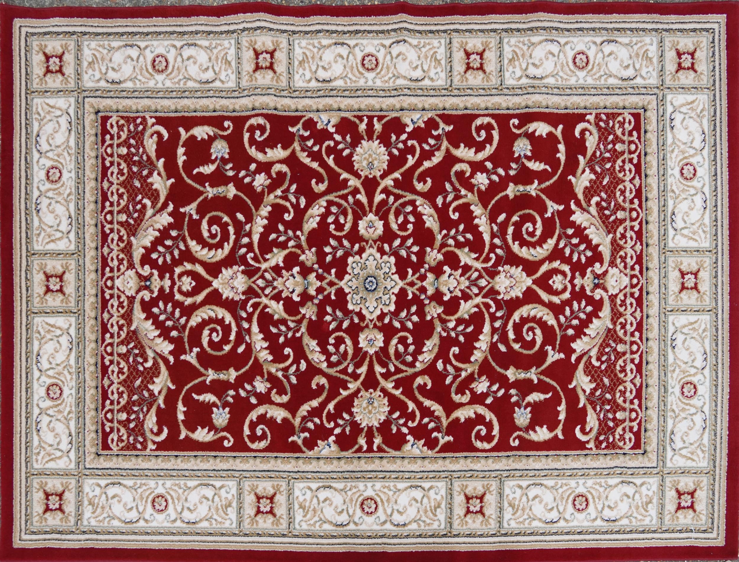 Rectangular red and cream ground floral rug, 230cm x 160cm