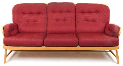 Ercol light elm Jubilee stick back three seater settee with red fleur de lis upholstered cushioned