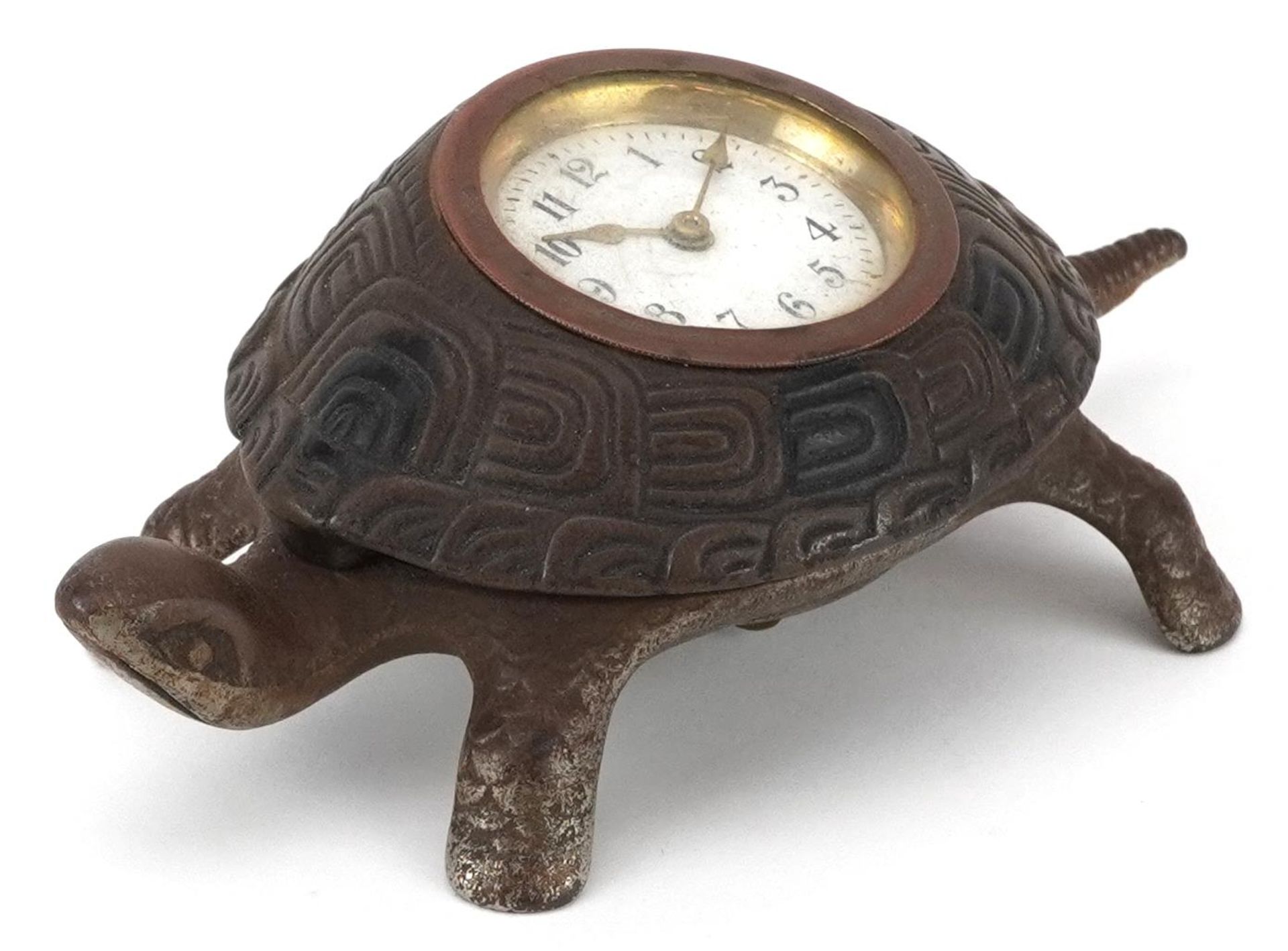 Victorian iron desk clock in the form of a turtle with enamelled dial having Arabic numerals, 17cm