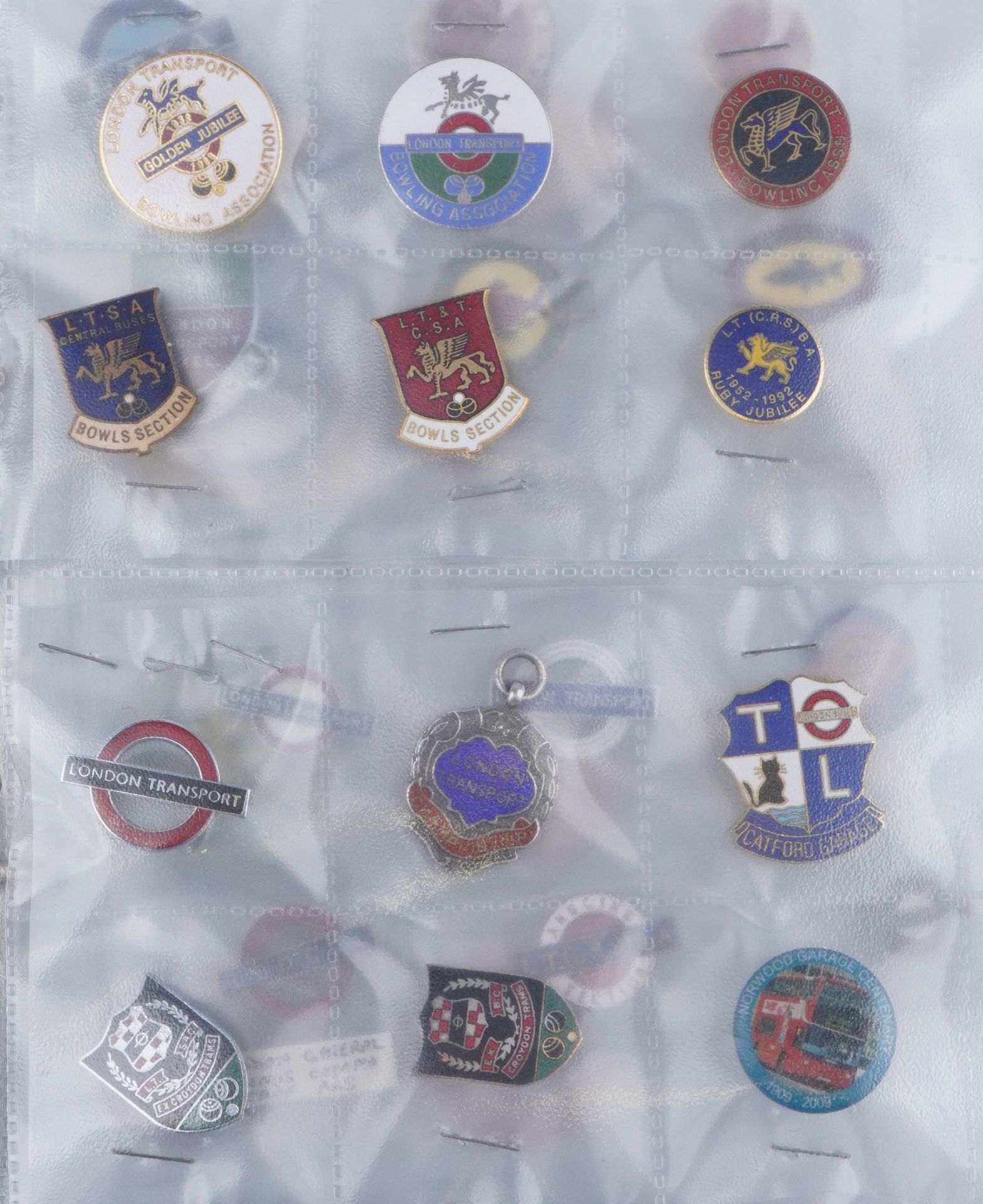 Large collection of automobilia and sporting interest badges and jewels, some arranged in an album