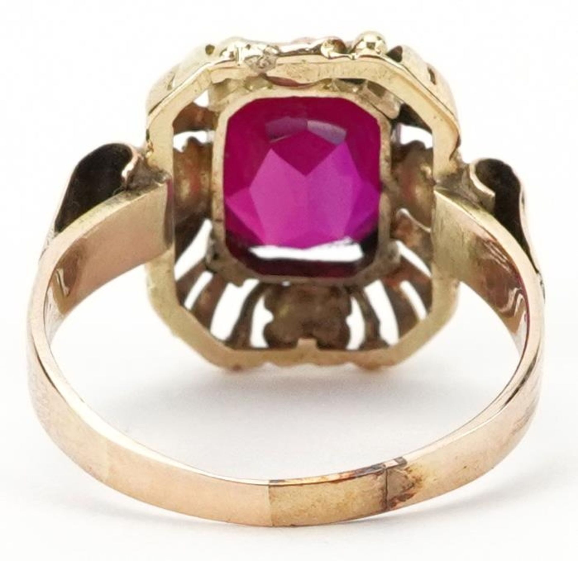 Continental unmarked gold ruby ring with pierced flower head setting, tests as 15ct gold, the ruby - Bild 2 aus 3