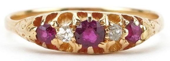 Antique 18ct gold graduated ruby and diamond five stone ring with pierced setting, the largest