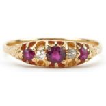 Antique 18ct gold graduated ruby and diamond five stone ring with pierced setting, the largest