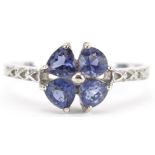 9ct white gold tanzanite flower head ring, size N, 2.0g